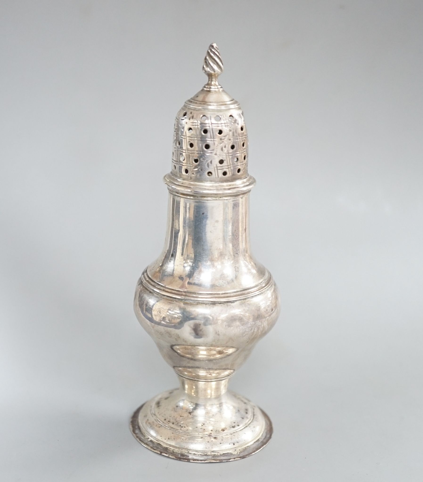 A George III silver baluster pepperette, Thomas Daniell, London, 1783, 13.2cm, 74 grams.